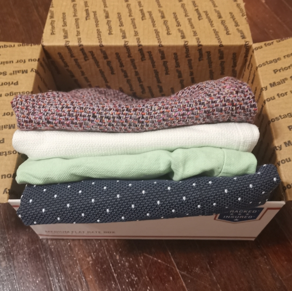 Box of Four Skirts Sized 0